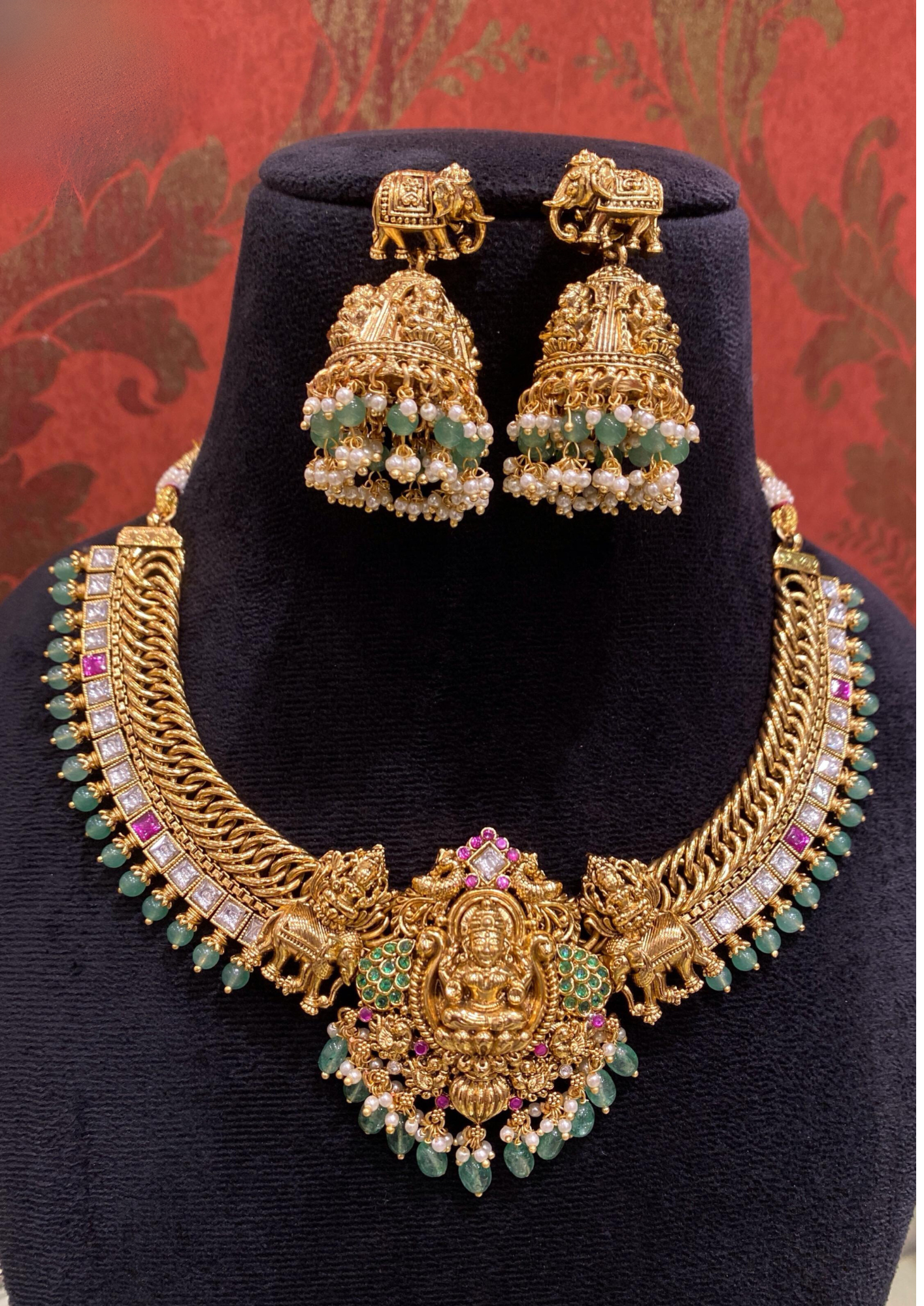 Kundan beads lord lakshmi necklace and earrings